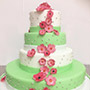 Tabler Hochzeitstorte in grün und pink.